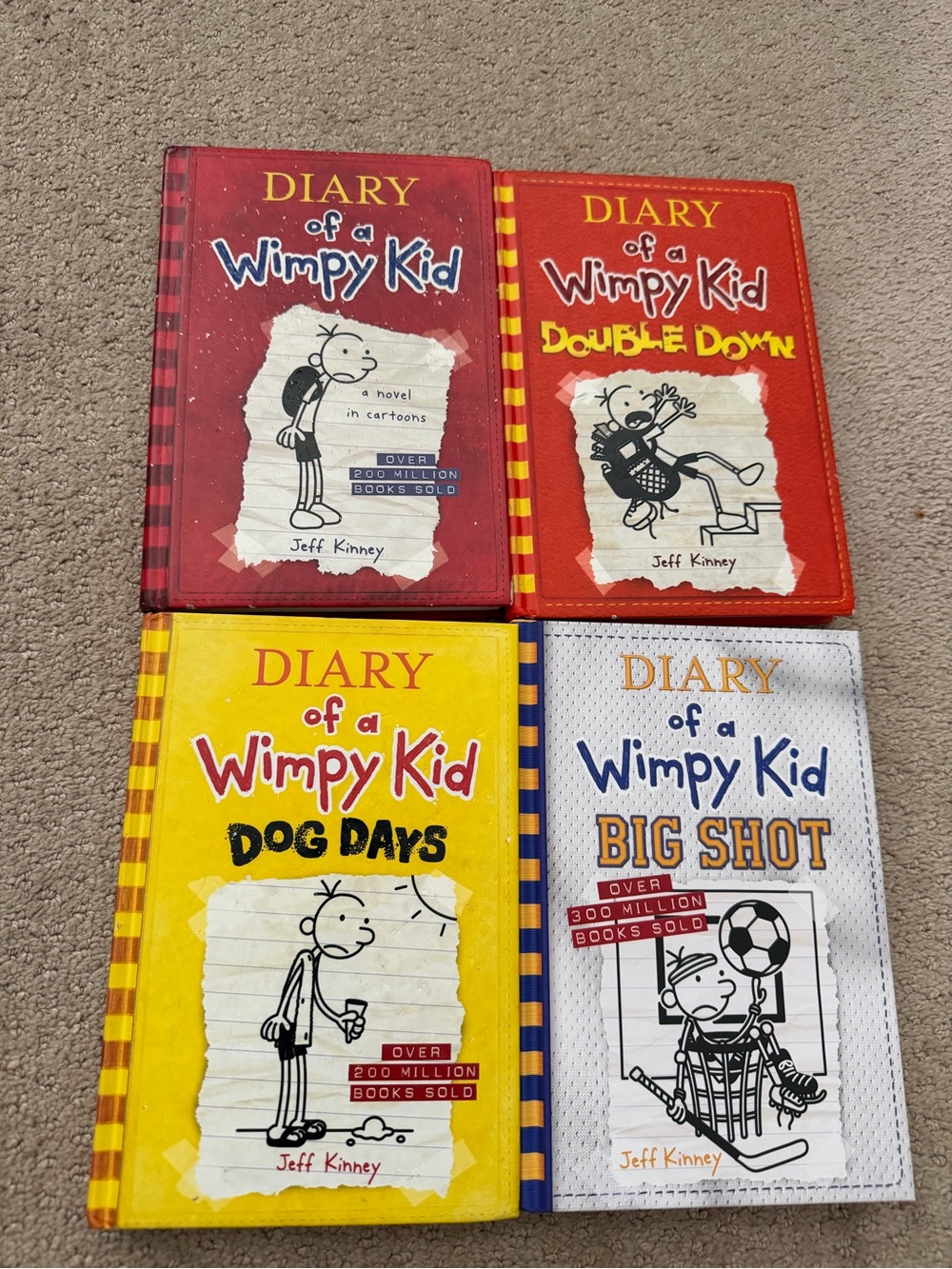 Diary of a Wimpy Kid 4-Book Set by Jeff Kinney - Red, Orange, Yellow, White